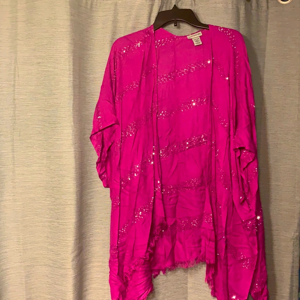 A beautiful sequined shawl by Catherine’s. One size, fits up to 3X